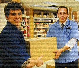 Willis and a fellow employee are forced to demonstrate how much fun it is to do a good job.